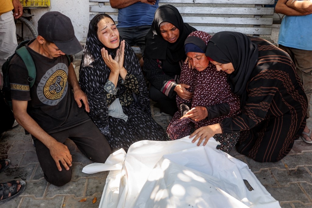 Humanitarian organisations fear for lives of people in Gaza as spotlight shifts to Iran