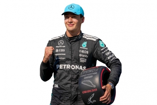 Russell roars to pole in Canada